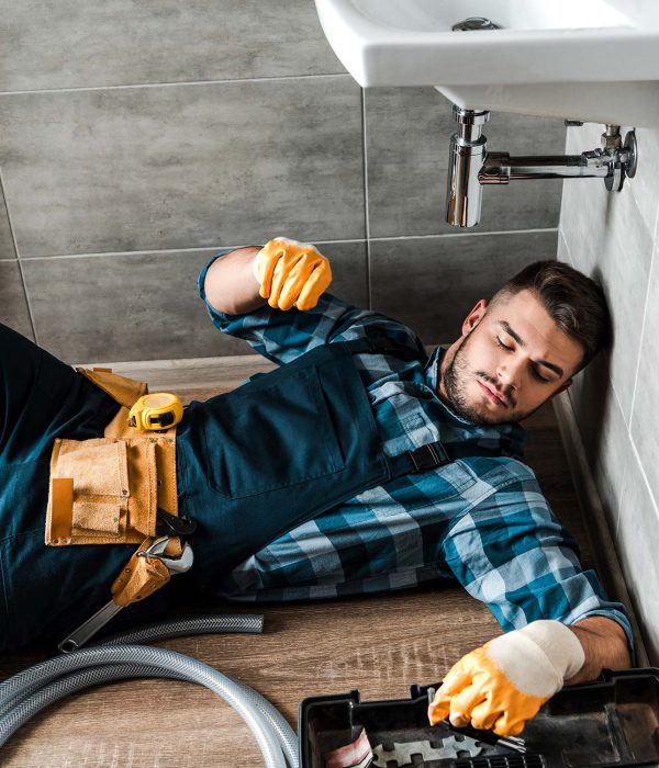 bearded-handyman-lying-on-floor-near-toolbox-in-ba-resize.jpg